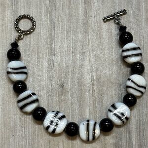 Elegant Glass Black and White Beaded Bracelet/toggle closure.